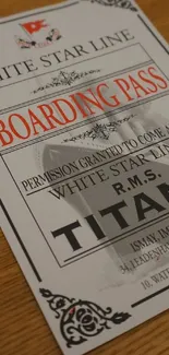 Vintage Titanic boarding pass wallpaper with detailed design.