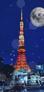 Tokyo Tower lit up at night with a full moon background.