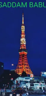 Vibrant Tokyo Tower glowing at night against a dark blue sky.