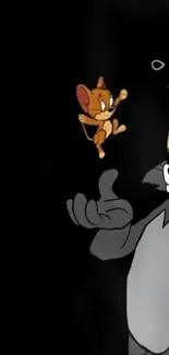 Tom and Jerry cartoon characters on a black background.