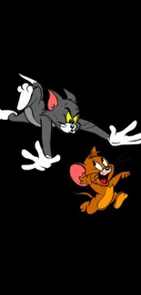 Tom and Jerry cartoon wallpaper on a black background.