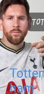 Football player in a Tottenham jersey with tattoos.