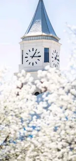 Mobile wallpaper of a tower with white blossoms.