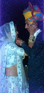 A couple in traditional Indian wedding attire embracing lovingly.