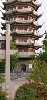 Traditional Asian pagoda surrounded by lush greenery.