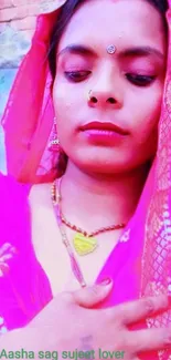 Portrait of woman in vibrant pink traditional attire