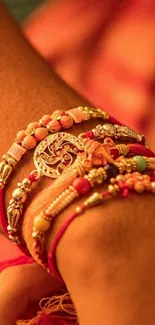 Festive Rakhi bracelets on wrist, symbolizing love.