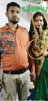 Traditional wedding portrait with vibrant attire.