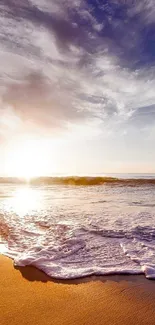 Stunning beach sunset with purple sky and gentle ocean waves.