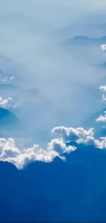 Scenic view of blue mountains and clouds creating a peaceful mobile wallpaper.