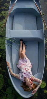 Woman relaxing in a boat surrounded by lily pads.