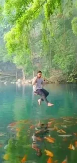 Man swings over lake with vibrant fish and lush greenery.