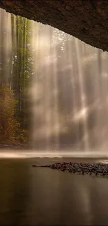 Serene waterfall in a lush forest setting, perfect for mobile wallpaper.