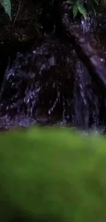 Serene forest waterfall cascading over mossy rocks.