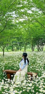 Woman sitting on a bench in a daisy-filled garden.