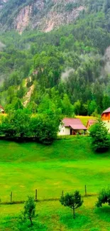 Lush green valley with cottages and misty mountains in the background.