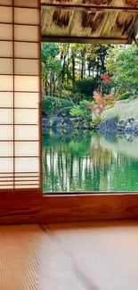 Japanese room with a garden view and serene pond through an open window.