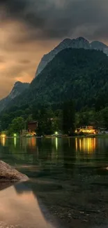 Serene lake, mountains, and evening glow.