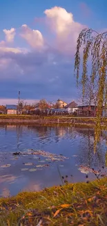 Serene sunset lakeside view with lush greenery and tranquil waters.