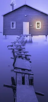 Lakeside cabin with purple ambiance and wooden path.