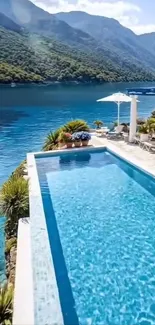 Luxurious pool with mountain and lake view, ideal for relaxation.