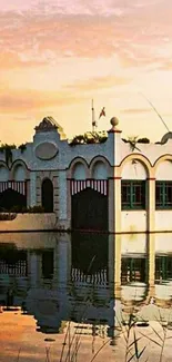 Lakeside white building reflecting in sunset waters, creating a serene and calming vista.