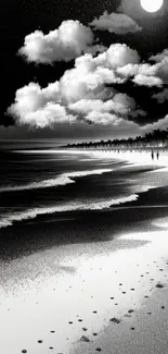 Black and white moonlit beach wallpaper with soft waves.