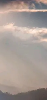 Tranquil mountain landscape with clouds.