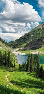 Serene mountain lake surrounded by greenery and clouds in a picturesque landscape.