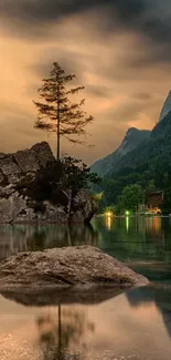 Tranquil mountain lake at sunset with reflections and vibrant colors.