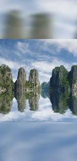 Mountainous landscape with tranquil lake reflection under a blue sky.