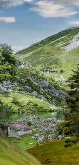 Serene mountain view with lush greenery and a tranquil river in the foreground.