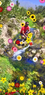 Man sits by a small stream amidst lush greenery and flowers.