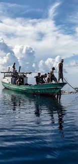 Fishing boat on calm ocean with blue sky backdrop.