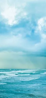 Tranquil ocean view with cloudy sky and waves in blue tones.