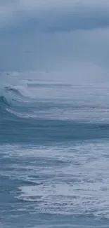 Peaceful ocean waves under a cloudy sky