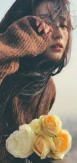 Woman outdoors with roses in serene background, dominant brown tones.