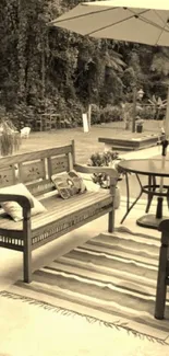 Sepia-toned patio with wooden furniture and lush greenery.