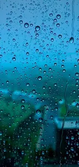 Raindrops on blue glass window creating a serene view