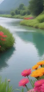 Serene river with vibrant flowers along the banks, ideal for wallpaper.