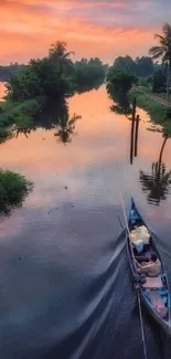 Peaceful river scene with sunset and boat.