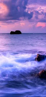 Serene purple seascape with dramatic clouds.