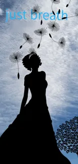 Silhouette of a woman with dandelions in a blue sky.