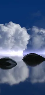 Serene reflection of stones and clouds over calm water.