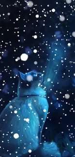 Cat sits under falling snowflakes on a tranquil blue night background.