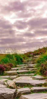 Tranquil stone pathway with flowers under a lavender sky.