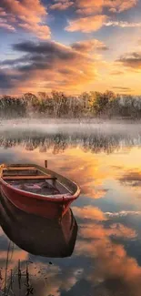 Tranquil sunset over a lake with a rowboat and vibrant sky reflections.