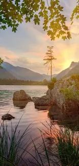 Serene lake sunset scene with vibrant sky and mountains.