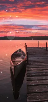 Serene sunset over a tranquil lake with a wooden dock and a small boat.