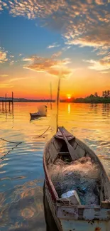 A tranquil sunset over a serene lake with a wooden boat in the foreground.